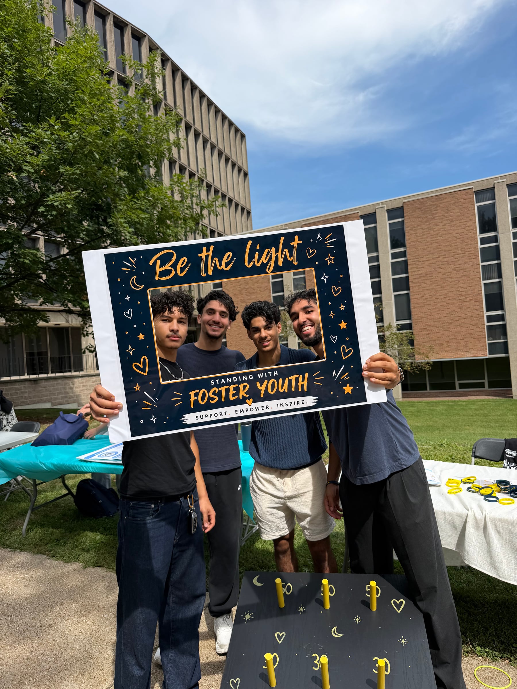 Four Little Lights team members at the University of Windsor Involvement Fair